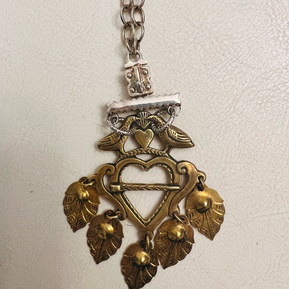 One of a kind Sennod 15 inch silver vignette chain with brass chain.